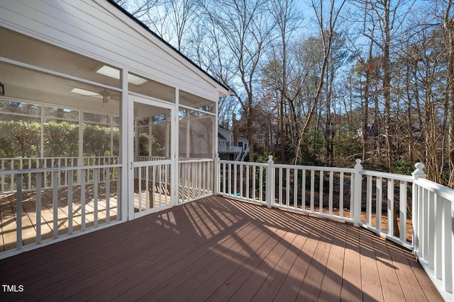 wooden terrace with a sunroom