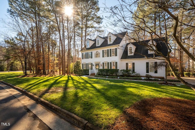 view of front of house with a front lawn