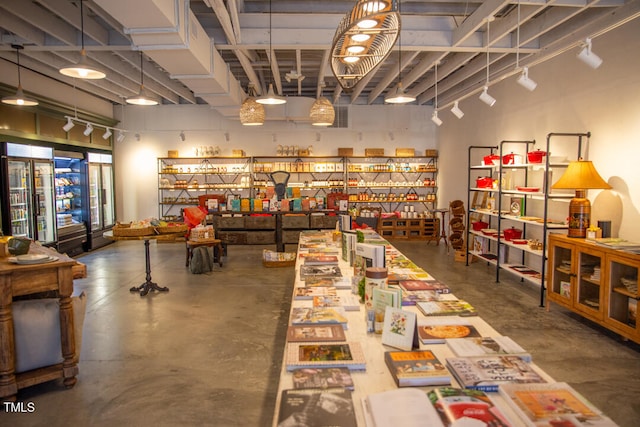 game room featuring concrete floors