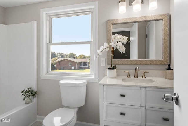 full bathroom featuring toilet, vanity, and shower / tub combination