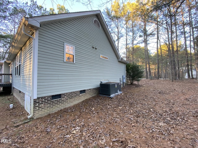 view of home's exterior with central AC