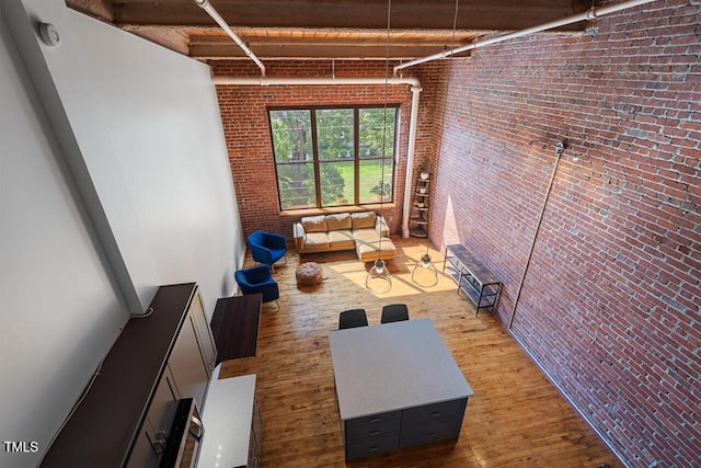 miscellaneous room featuring brick wall