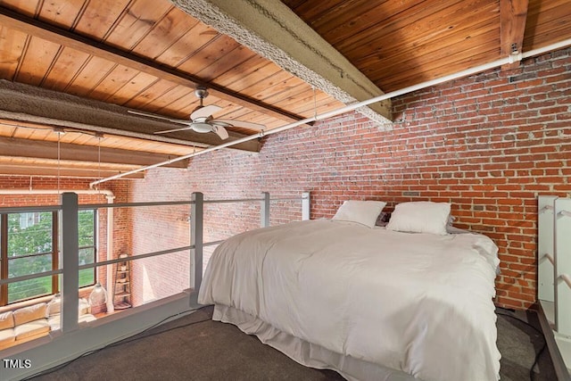 unfurnished bedroom featuring wooden ceiling, carpet floors, beamed ceiling, brick wall, and ceiling fan