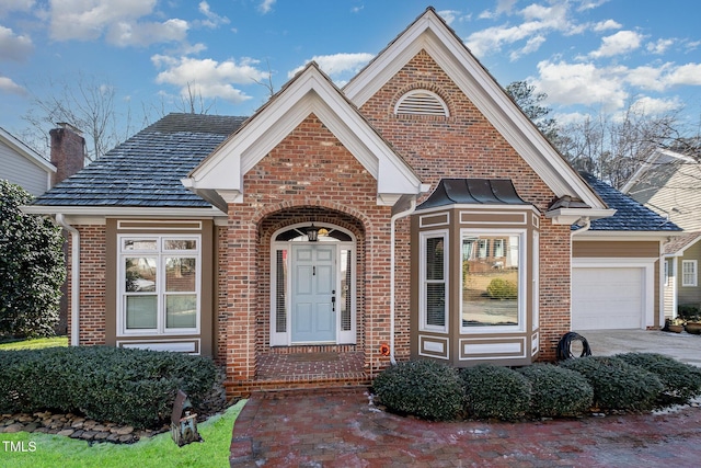 view of front of property with a garage