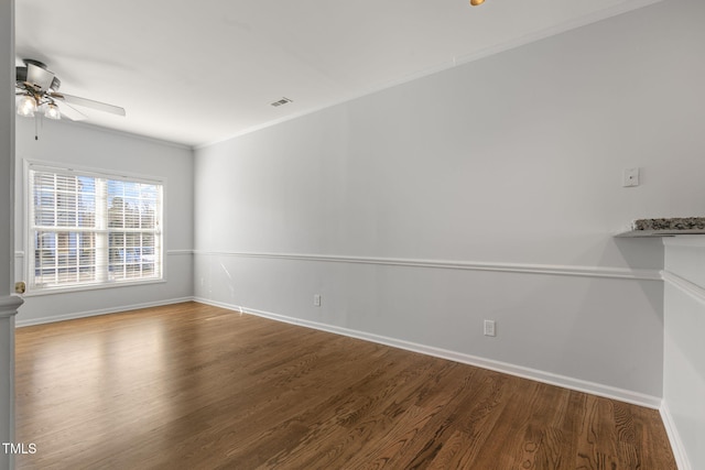 unfurnished room with hardwood / wood-style floors, ceiling fan, and ornamental molding