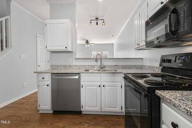 kitchen with white cabinets, sink, dark hardwood / wood-style floors, and black appliances