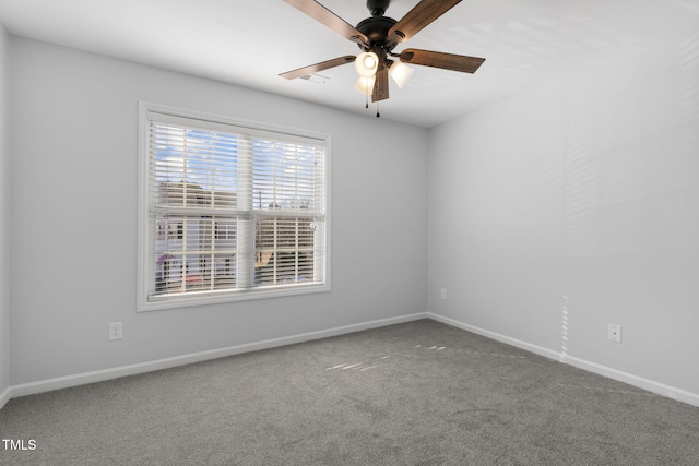 carpeted empty room with ceiling fan