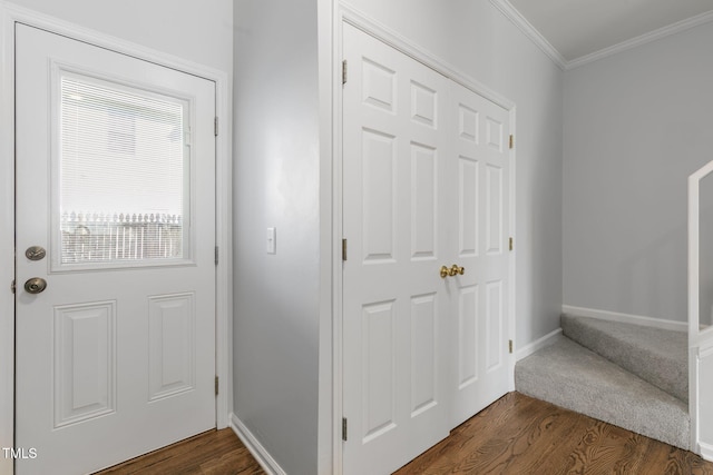 interior space with crown molding and dark hardwood / wood-style floors