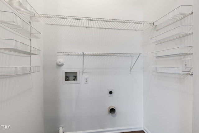 washroom with hookup for a washing machine, gas dryer hookup, and hookup for an electric dryer