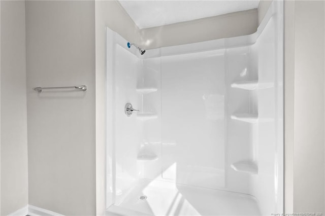 bathroom with walk in shower