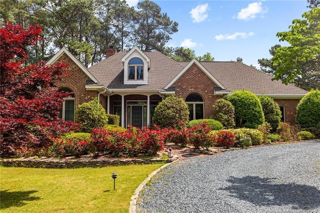 view of front of home featuring a front yard