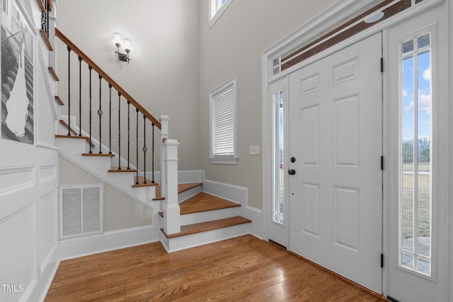 entryway with wood-type flooring