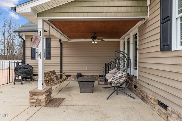 view of patio / terrace featuring ceiling fan and grilling area