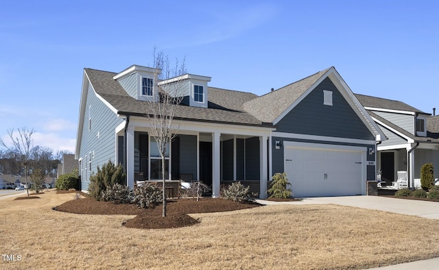 view of front facade featuring a garage and a front lawn