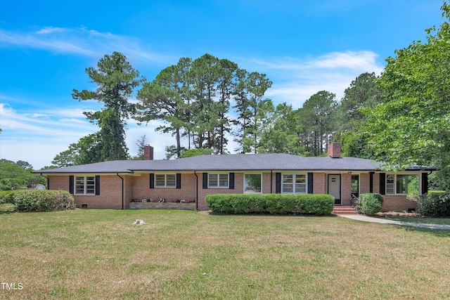 single story home with a front yard