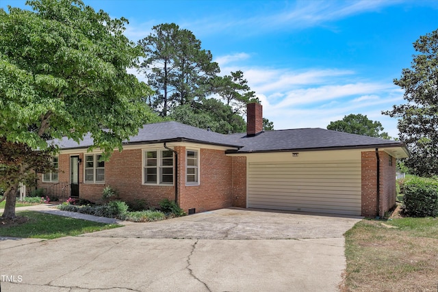 ranch-style home with a garage