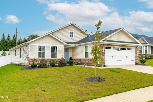 craftsman-style house with a front yard and a garage