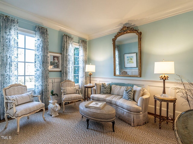 living area with ornamental molding