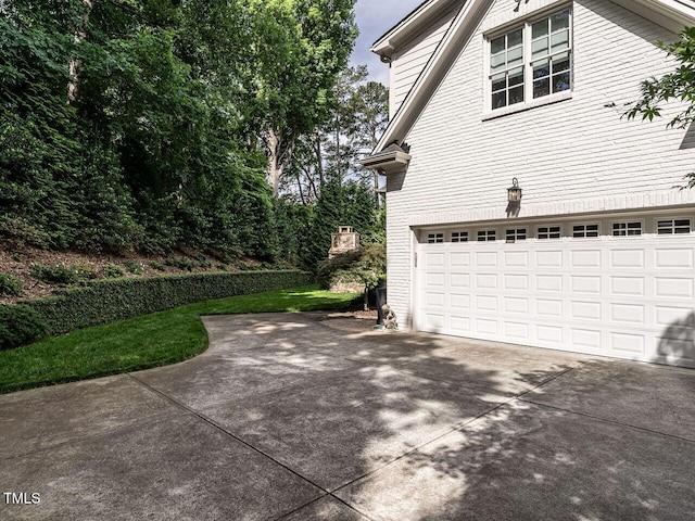 2900 Glenanneve Pl, Raleigh, NC 27608 - view of side of property with concrete driveway and an attached garage