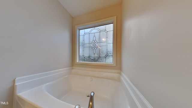 bathroom with a bath