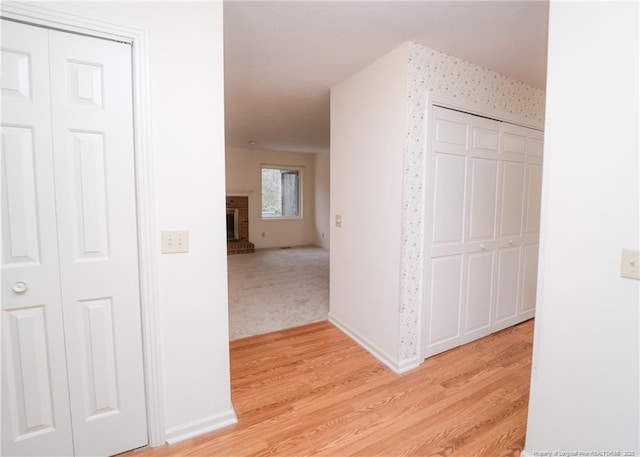 hallway featuring light hardwood / wood-style flooring