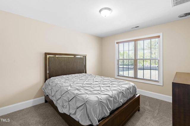 bedroom with light carpet