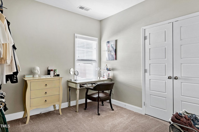 view of carpeted office space