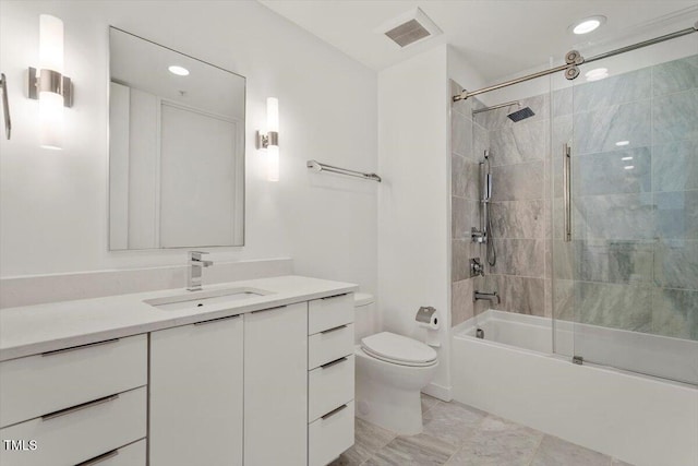 bathroom with toilet, bathing tub / shower combination, vanity, and visible vents