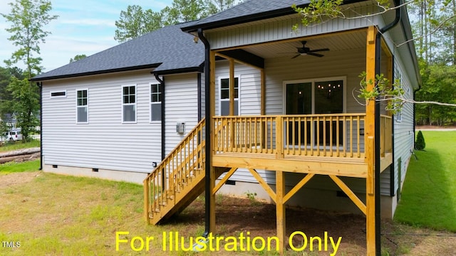 rear view of house featuring ceiling fan, a yard, and a wooden deck