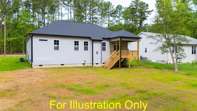 back of house featuring a yard and central AC