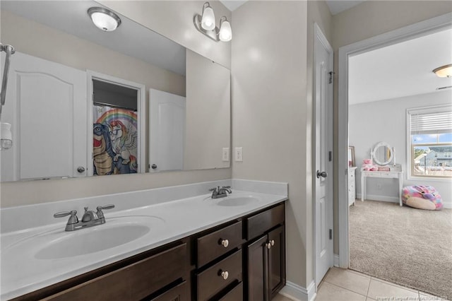 bathroom featuring vanity and tile patterned flooring