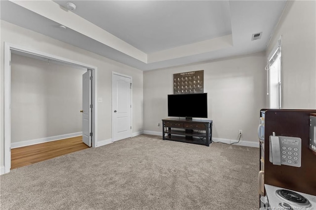 interior space featuring a tray ceiling