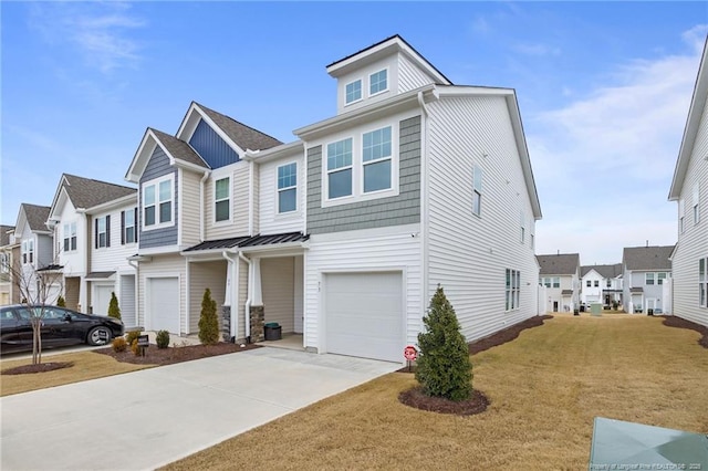 view of front of house with a front lawn and a garage