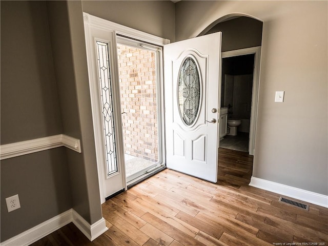 entrance foyer featuring hardwood / wood-style floors