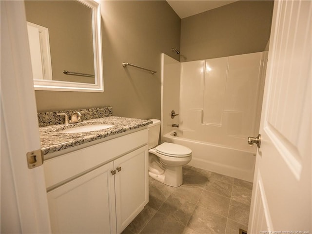 full bathroom with toilet, vanity, and shower / tub combination