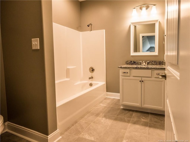 full bathroom featuring bathing tub / shower combination, vanity, and toilet