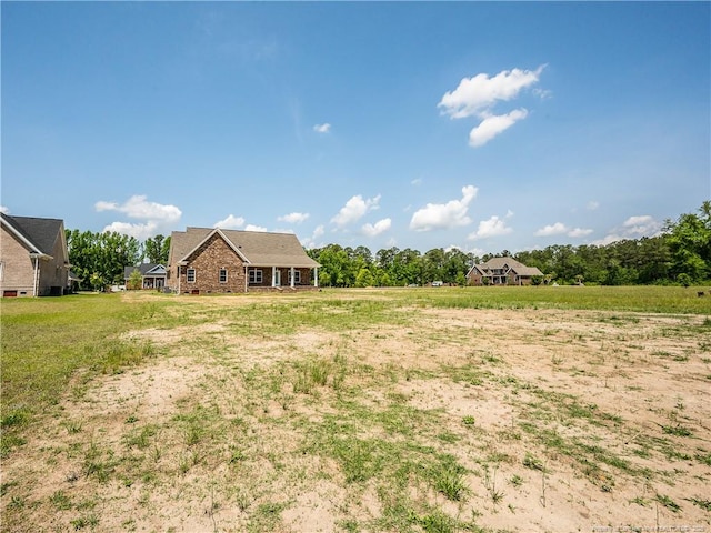 view of yard featuring a rural view