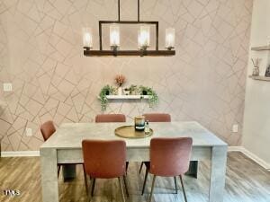 dining area with hardwood / wood-style floors