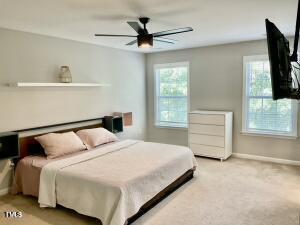 bedroom featuring ceiling fan