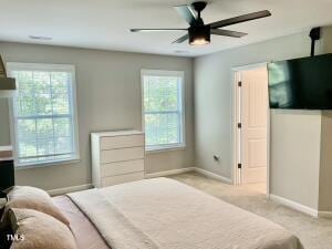 carpeted bedroom featuring ceiling fan