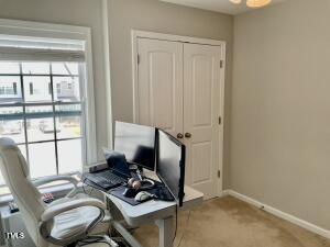 office area with light carpet