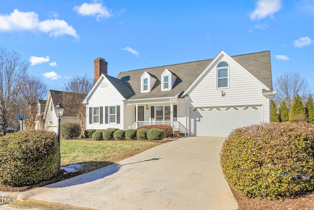 cape cod home featuring a porch and a front yard