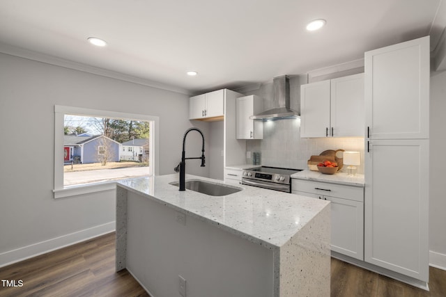 kitchen featuring sink, white cabinets, electric range, and wall chimney exhaust hood