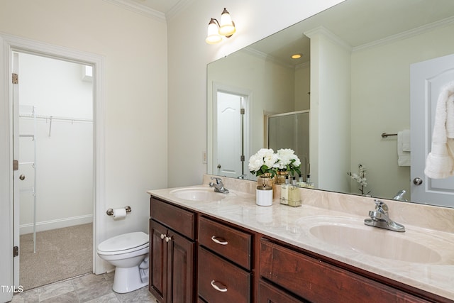 bathroom featuring vanity, walk in shower, toilet, and ornamental molding