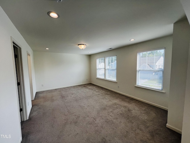 view of carpeted spare room