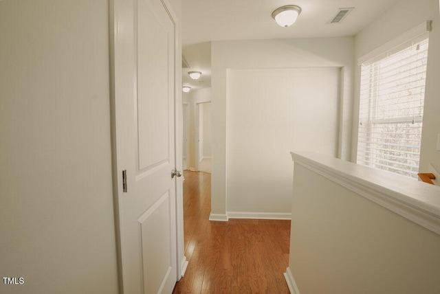 hallway featuring hardwood / wood-style floors