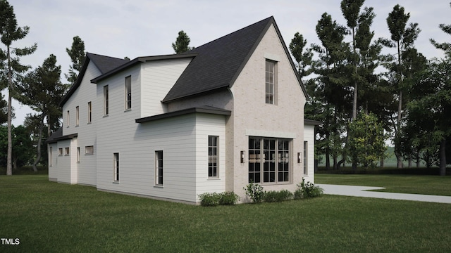 view of home's exterior featuring a lawn