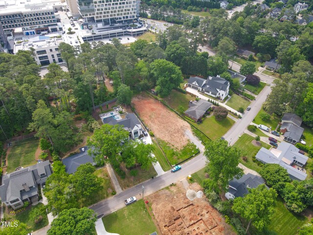 4112 Rockingham Dr, Raleigh, NC 27609 - aerial view of property and surrounding area featuring nearby suburban area