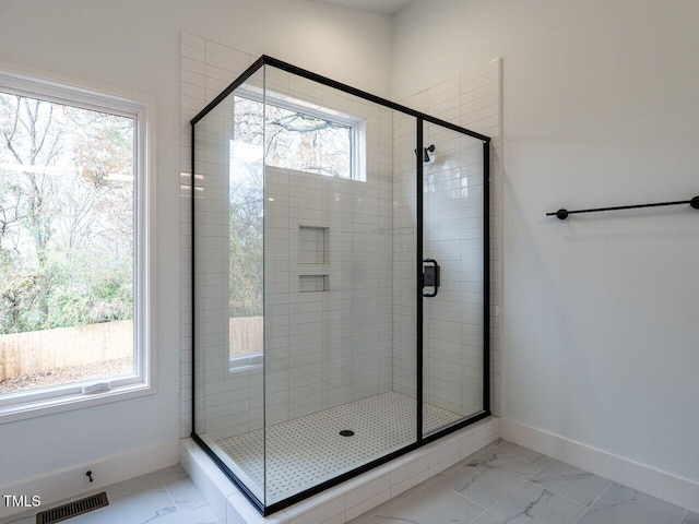 bathroom with walk in shower