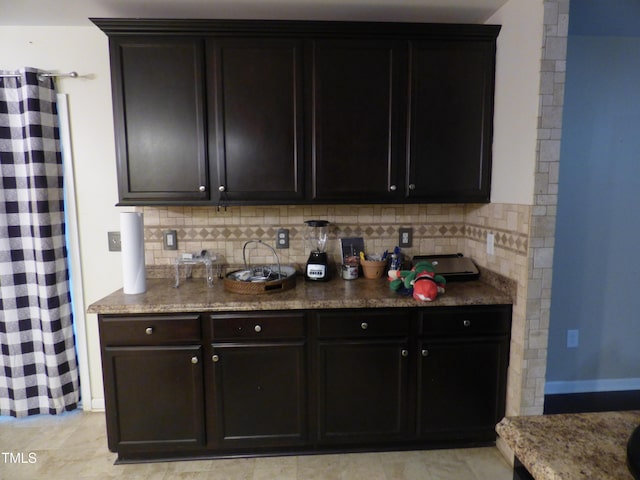 bar featuring decorative backsplash